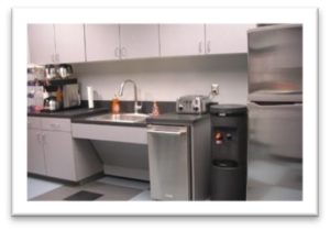 an empty grey kitchen